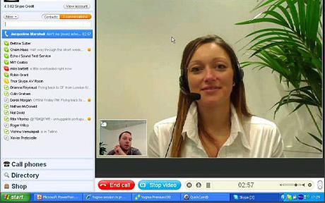 A teacher using Skype to teach English